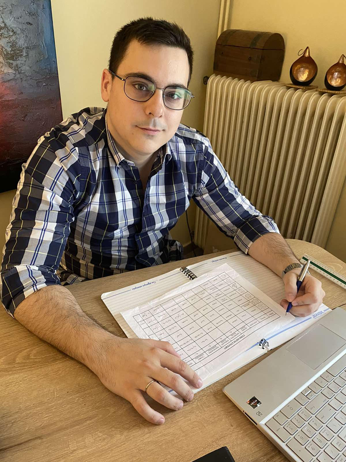 Alexandros at His Desk — Preparing Lessons